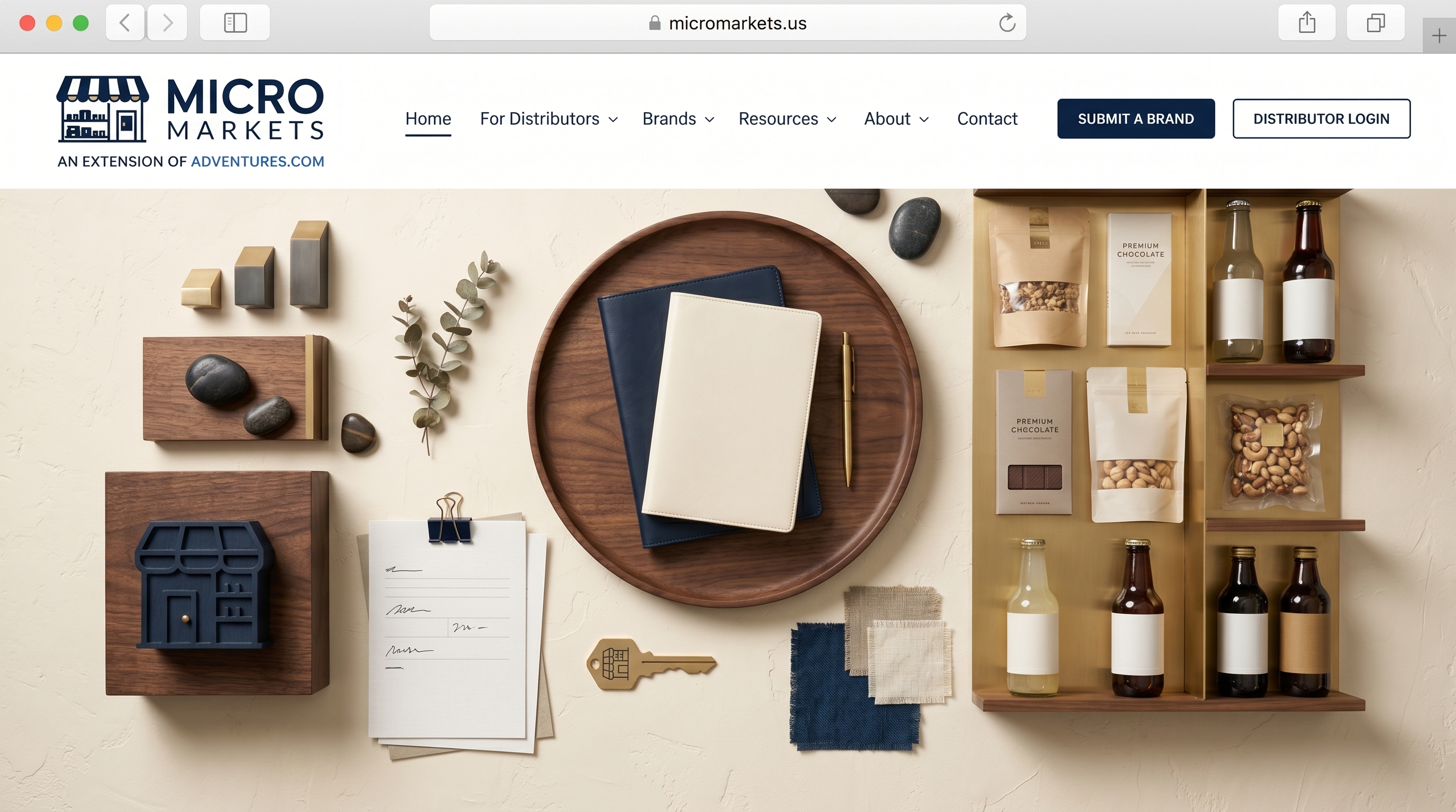 Editorial top-down still life on a warm cream surface — a wood tray with neutral packaged goods, a clipboard of distributor notes, a coffee cup, and small tools arranged for a brand-introduction review.